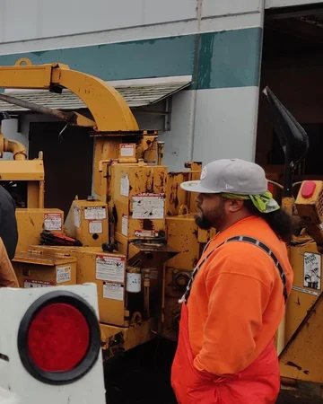 A crew member before tree fertilization in Folsom, CA